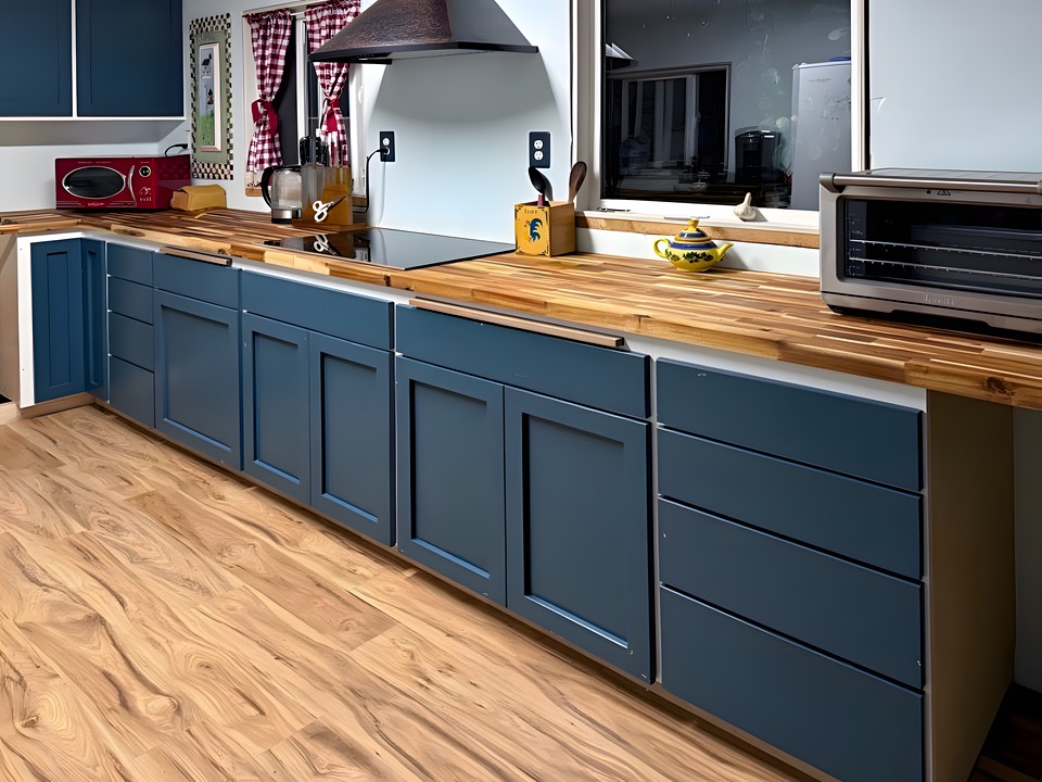 Remodeled kitchen cabinet with custom wooden countertops